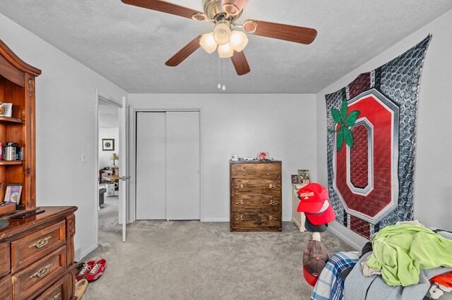 524.526 Rudy Rd, Mansfield, OH 44903 - carpeted bedroom with a textured ceiling, a closet, a ceiling fan, and baseboards