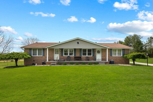 524.526 Rudy Rd, Mansfield, OH 44903 - ranch-style home with brick siding, a porch, and a front lawn