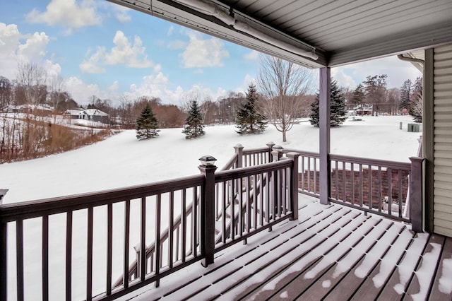 view of snow covered deck