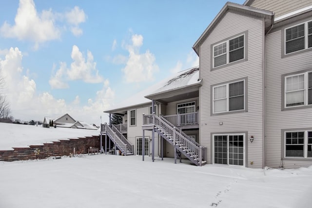 view of snow covered house