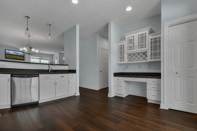 kitchen featuring white cabinetry, dishwasher, an inviting chandelier, dark hardwood / wood-style floors, and decorative light fixtures