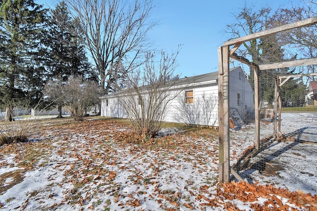 view of snow covered property