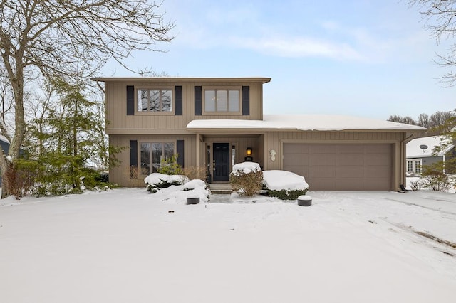 view of front of property featuring a garage