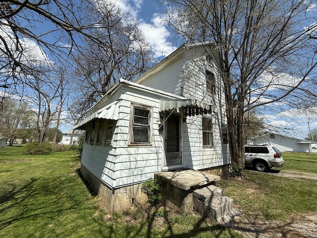 exterior space with a yard