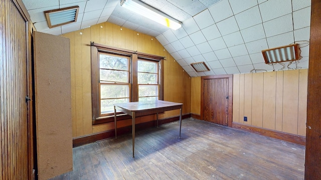 531 Jackson Rd, Galion, OH 44833 - unfurnished office with hardwood / wood-style floors, lofted ceiling, and wood walls
