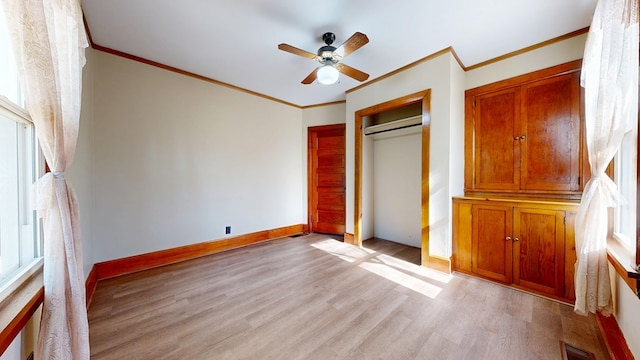 531 Jackson Rd, Galion, OH 44833 - unfurnished bedroom featuring light wood-style flooring, ornamental molding, multiple windows, baseboards, and a closet