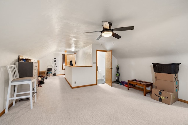 501 Clifton Blvd, Mansfield, OH 44907 - additional living space featuring a ceiling fan, baseboards, carpet floors, lofted ceiling, and a desk