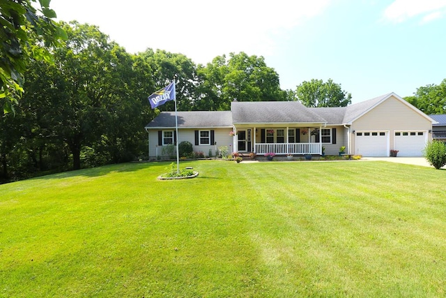 10411 River Rd, Huron, OH 44839 - single story home with covered porch, an attached garage, a front lawn, and concrete driveway