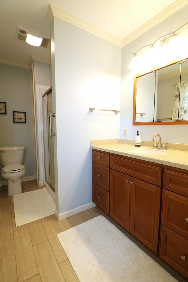 10411 River Rd, Huron, OH 44839 - full bathroom with vanity, a shower stall, ornamental molding, and wood finished floors