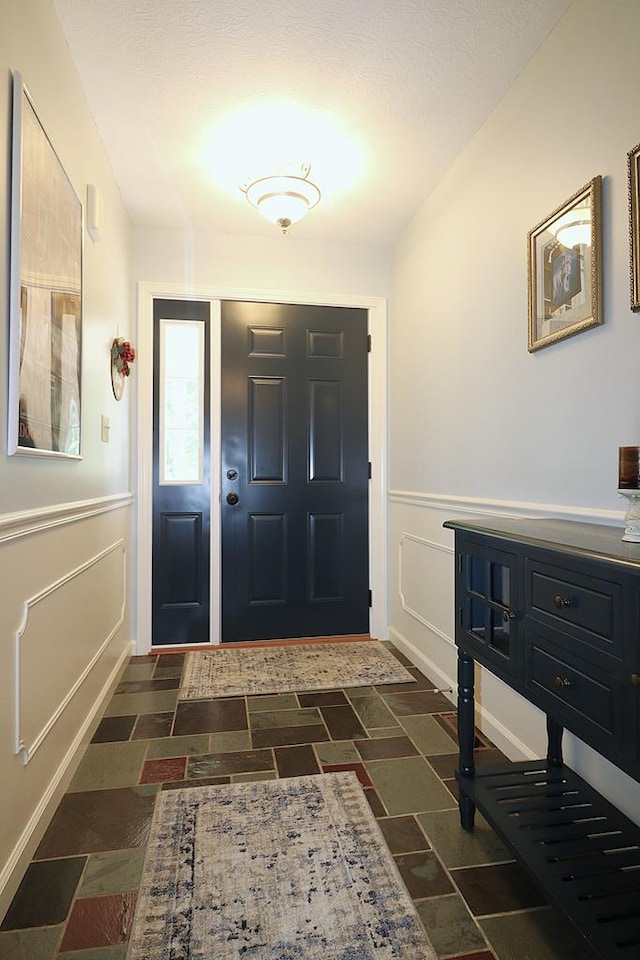 10411 River Rd, Huron, OH 44839 - entryway with wainscoting