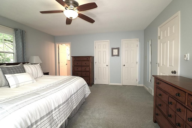 10411 River Rd, Huron, OH 44839 - bedroom featuring two closets, carpet, ceiling fan, and ensuite bathroom