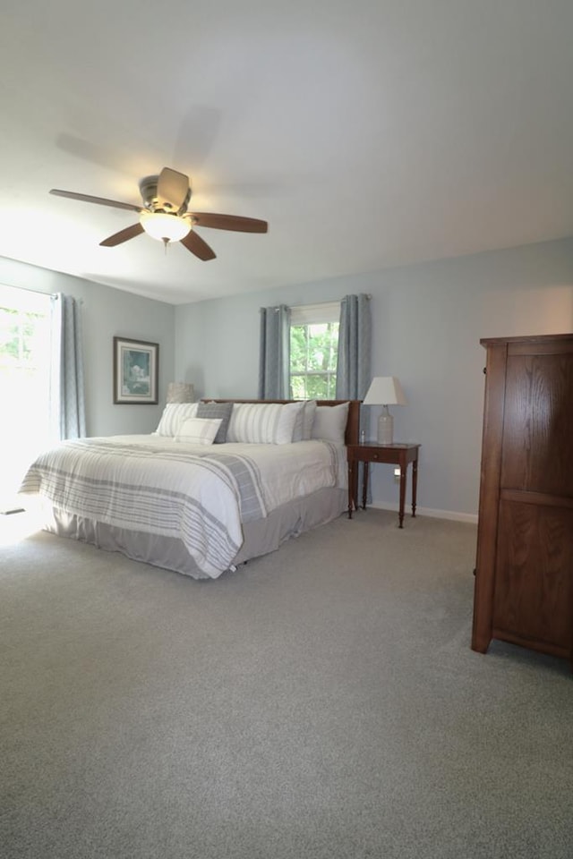 10411 River Rd, Huron, OH 44839 - bedroom featuring light colored carpet and a ceiling fan