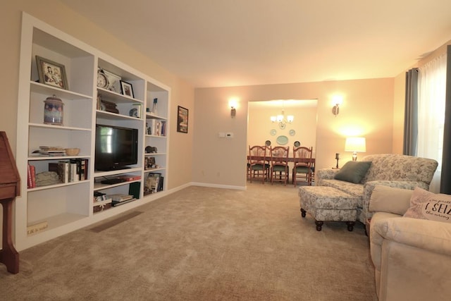 10411 River Rd, Huron, OH 44839 - carpeted living area with a chandelier and built in features