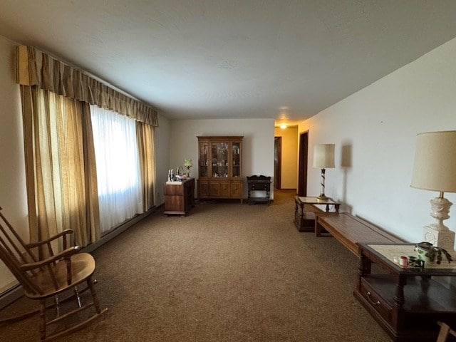 bedroom featuring dark colored carpet