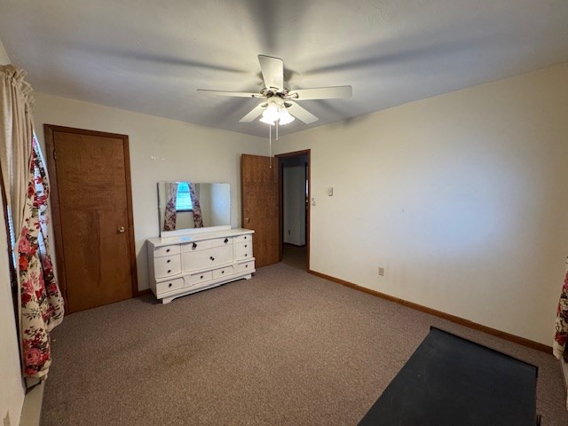 bedroom with carpet floors and ceiling fan