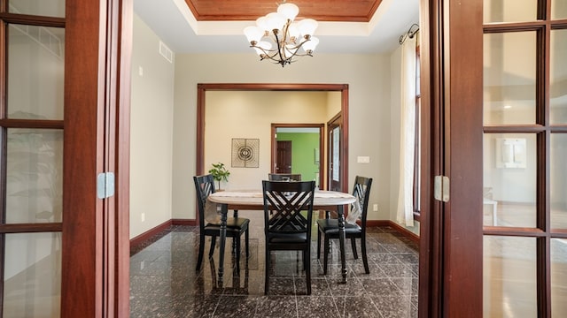 1439 Township Rd Unit 1238, Ashland, OH 44805 - dining room with granite tiled floors, a chandelier, baseboards, and a tray ceiling