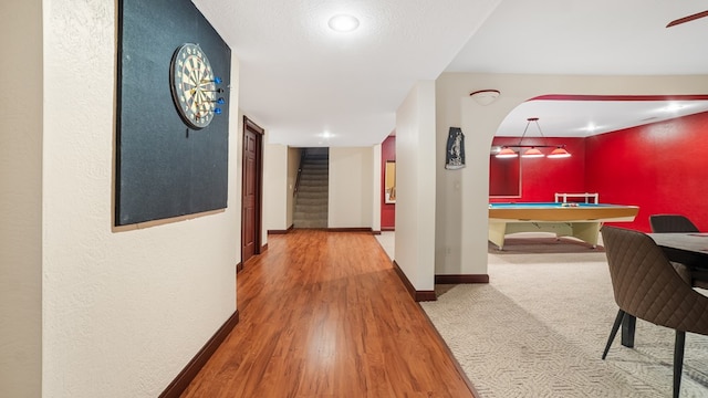 1439 Township Rd Unit 1238, Ashland, OH 44805 - corridor featuring baseboards, stairs, wood finished floors, and a textured wall
