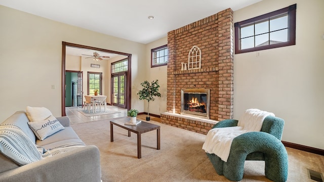 1439 Township Rd Unit 1238, Ashland, OH 44805 - living room featuring carpet floors, a fireplace, baseboards, and a ceiling fan
