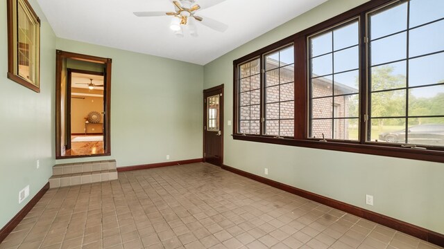 1439 Township Rd Unit 1238, Ashland, OH 44805 - tiled empty room featuring ceiling fan and baseboards