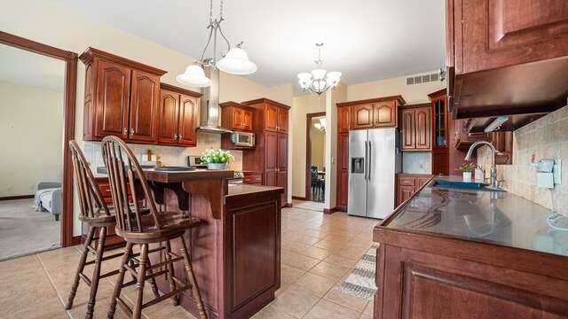1439 Township Rd Unit 1238, Ashland, OH 44805 - kitchen with appliances with stainless steel finishes, a sink, a kitchen bar, dark countertops, and glass insert cabinets