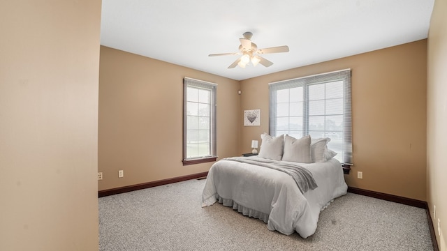 1439 Township Rd Unit 1238, Ashland, OH 44805 - bedroom with light colored carpet, baseboards, and a ceiling fan