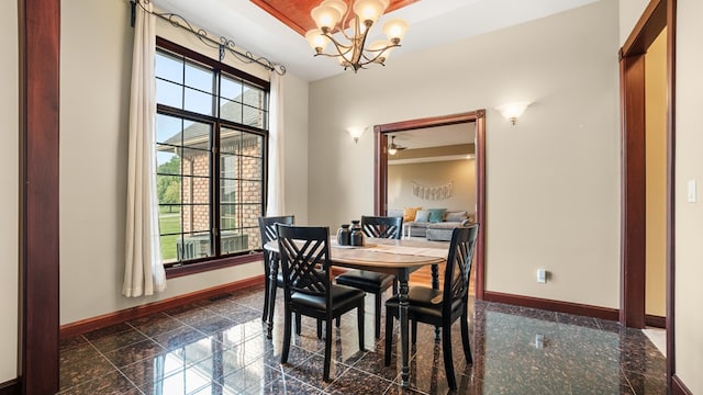 1439 Township Rd Unit 1238, Ashland, OH 44805 - dining area with granite tiled floors, baseboards, and a chandelier