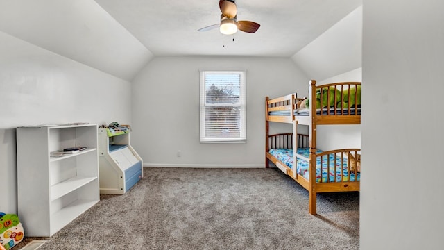 carpeted bedroom featuring vaulted ceiling and ceiling fan