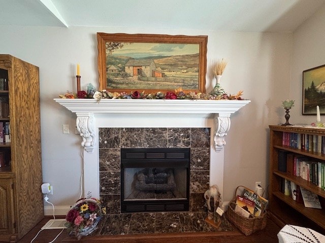 sitting room featuring a fireplace