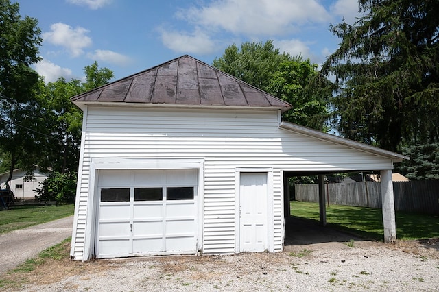 garage with a yard