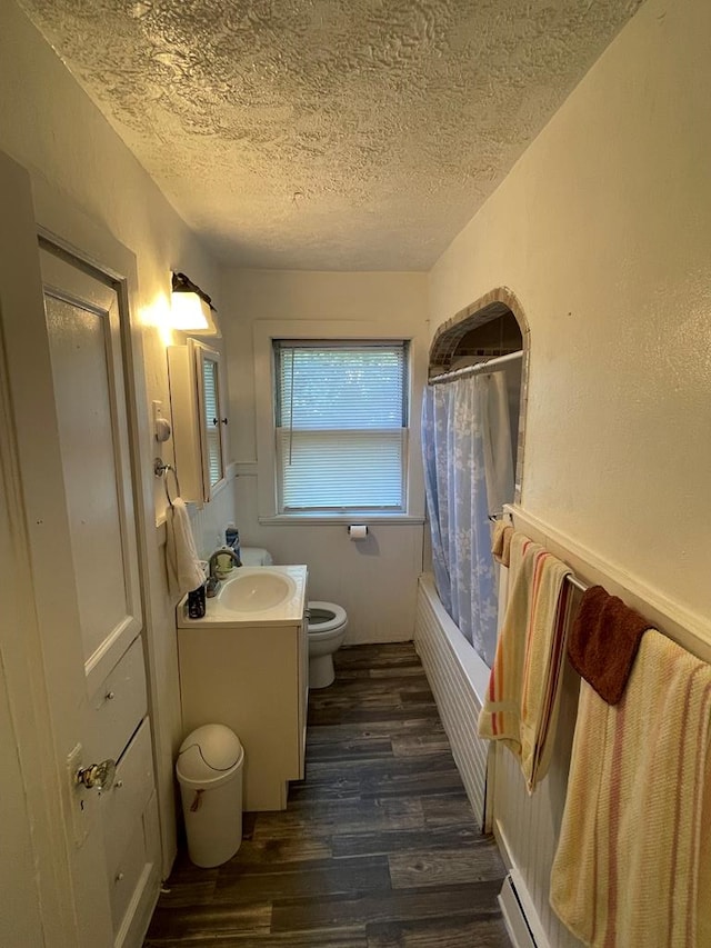 148 Dale Ave, Mansfield, OH 44902 - full bathroom with wood finished floors, vanity, a textured ceiling, and shower / tub combo