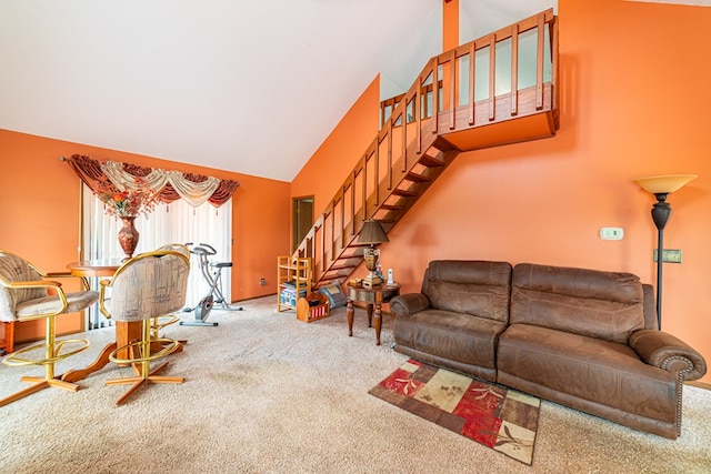 7326 State Route 19 Unit 47-48, Mount Gilead, OH 43338 - carpeted living area featuring stairs and high vaulted ceiling