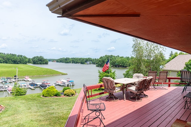 7326 State Route 19 Unit 47-48, Mount Gilead, OH 43338 - wooden deck featuring a water view, a lawn, and outdoor dining space