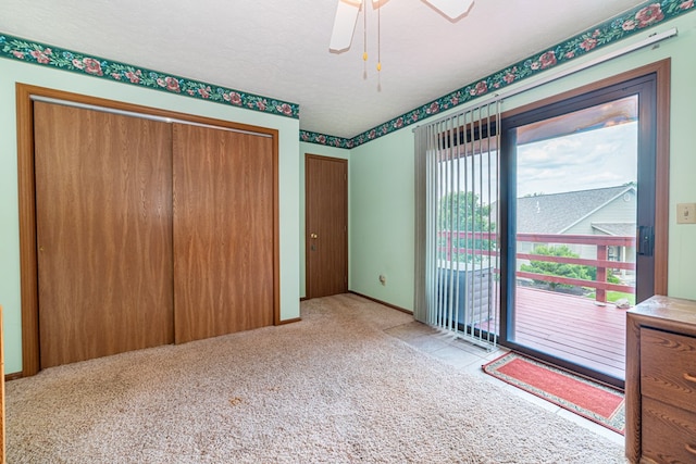 7326 State Route 19 Unit 47-48, Mount Gilead, OH 43338 - unfurnished bedroom featuring access to exterior, carpet, and a ceiling fan