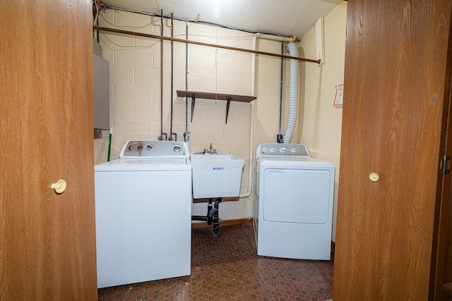 7326 State Route 19 Unit 47-48, Mount Gilead, OH 43338 - washroom featuring washing machine and clothes dryer, concrete block wall, and electric panel