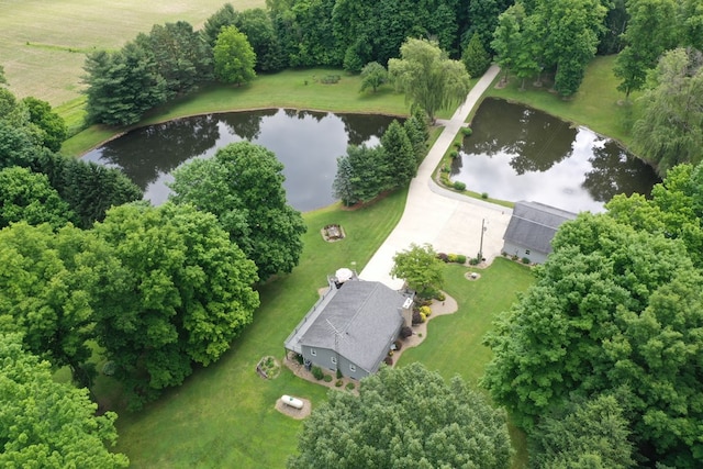 bird's eye view with a water view