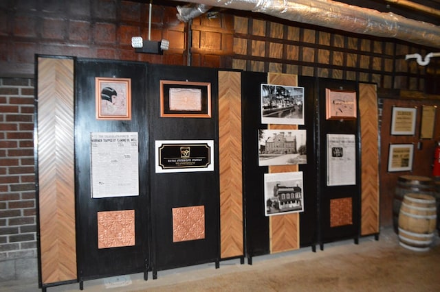 interior space featuring wood walls