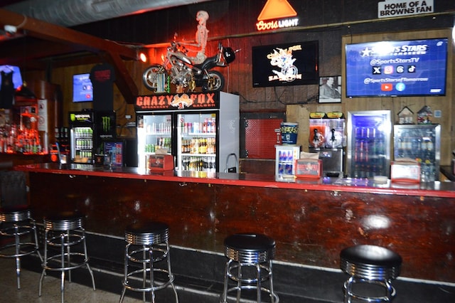 bar with wood walls and sink