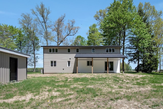 5616 Windfall Rd, Galion, OH 44833 - rear view of property with metal roof and a yard
