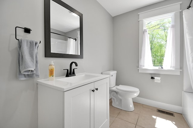5616 Windfall Rd, Galion, OH 44833 - bathroom featuring vanity, toilet, tile patterned flooring, baseboards, and a shower with shower curtain