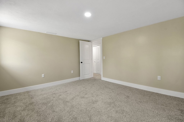 5616 Windfall Rd, Galion, OH 44833 - spare room with light colored carpet, baseboards, and recessed lighting