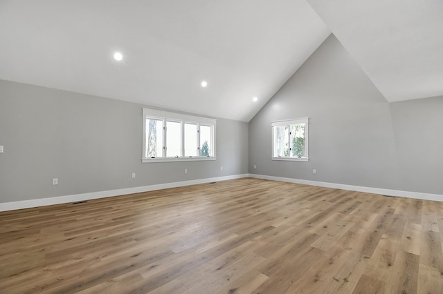5616 Windfall Rd, Galion, OH 44833 - additional living space with light wood finished floors, baseboards, recessed lighting, and high vaulted ceiling