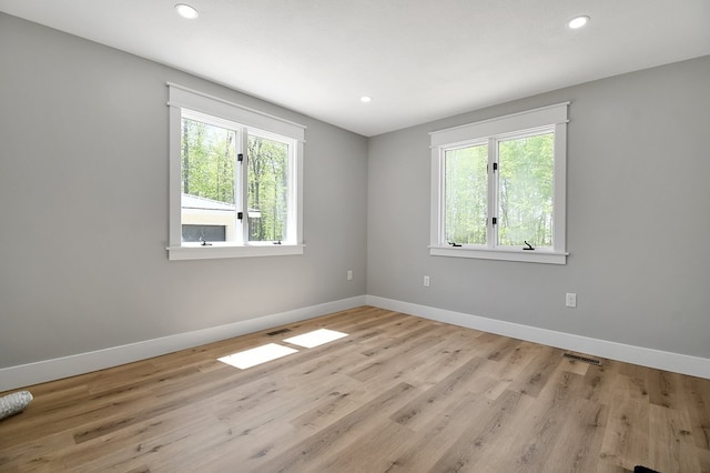 5616 Windfall Rd, Galion, OH 44833 - spare room with baseboards, light wood-style floors, and recessed lighting
