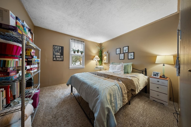 carpeted bedroom with a textured ceiling