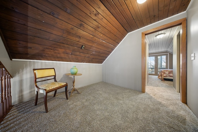 living area with wooden ceiling, carpet, and lofted ceiling