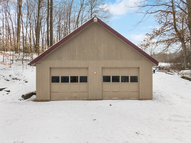 view of snow covered garage