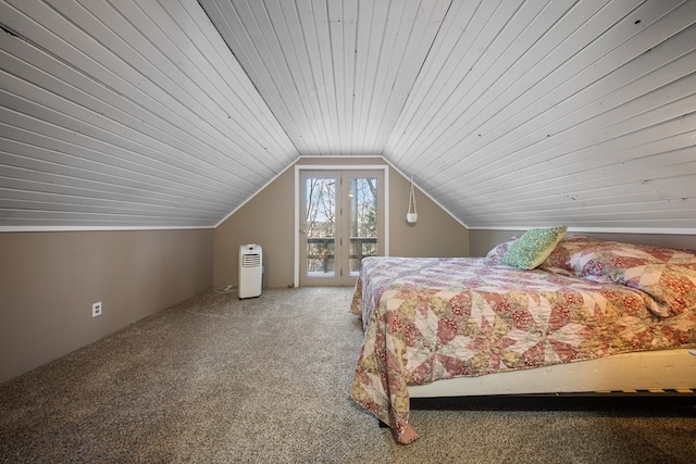 bedroom featuring carpet floors, lofted ceiling, and wood ceiling