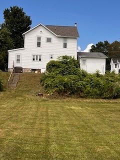 67 S Gamble St, Shelby, OH 44875 - back of house featuring a lawn