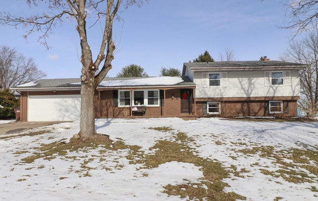 split level home with a garage