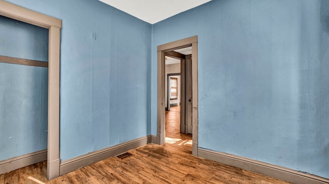 unfurnished bedroom featuring wood-type flooring