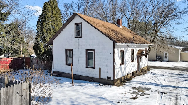 view of snow covered property